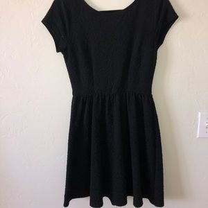 Black cap-sleeve dress